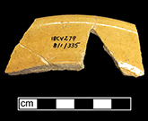Midlands Yellow rim sherd of indeterminate vessel, possibly a plate, 8.5" diameter, with colorless lead glaze on interior and exterior of buff paste, identified by Jacqueline Pearce in May 1999, from Compton Site 18CV279.
